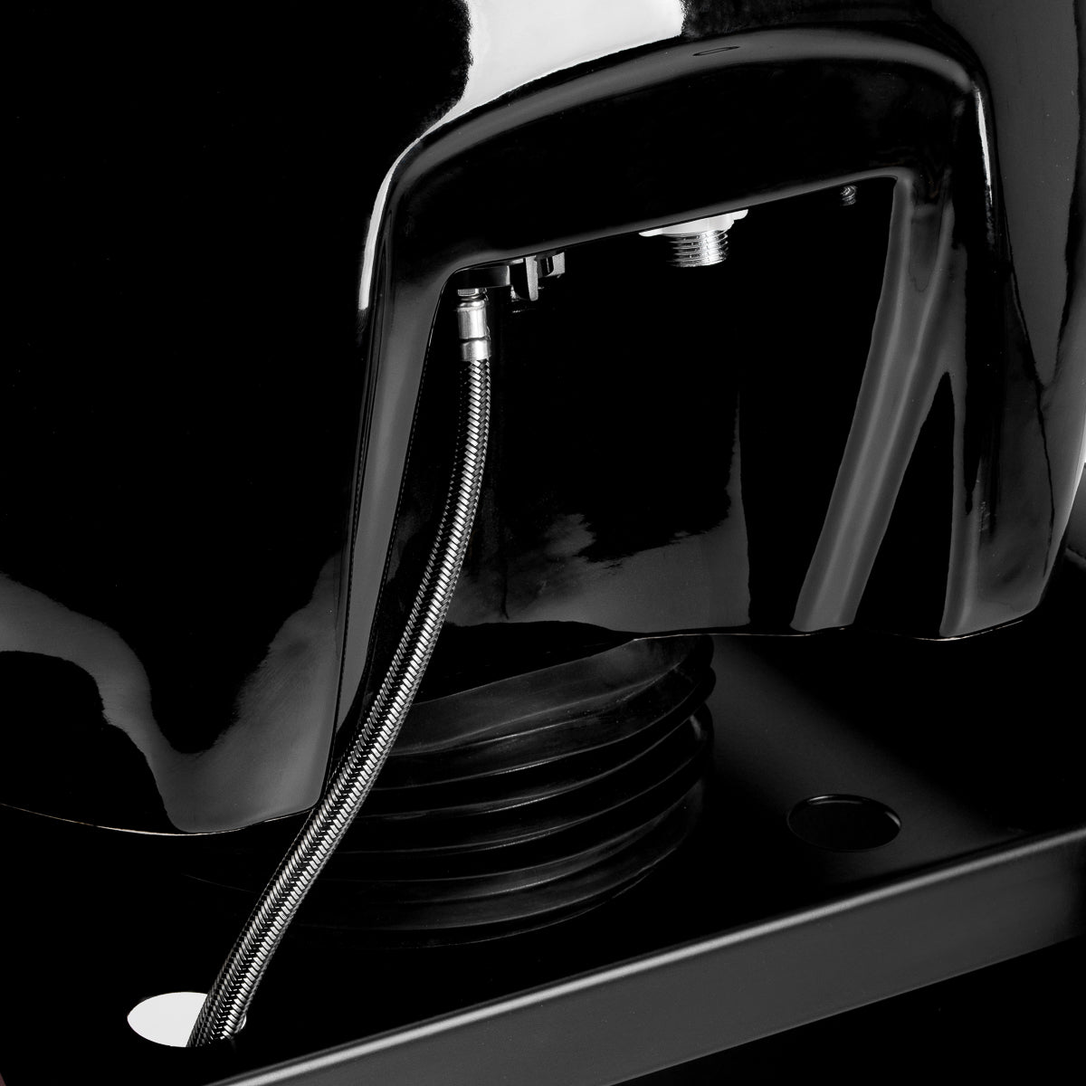 Omega Nautica black hairdressing wash unit with sink, chair, and professional styling station for salon use.
