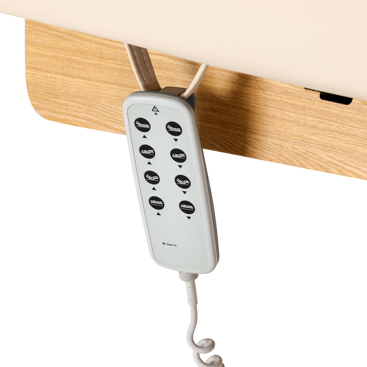 Cream-colored SPA lounger Sillon Siesta with light brown base, designed for beauty salon comfort and relaxation.