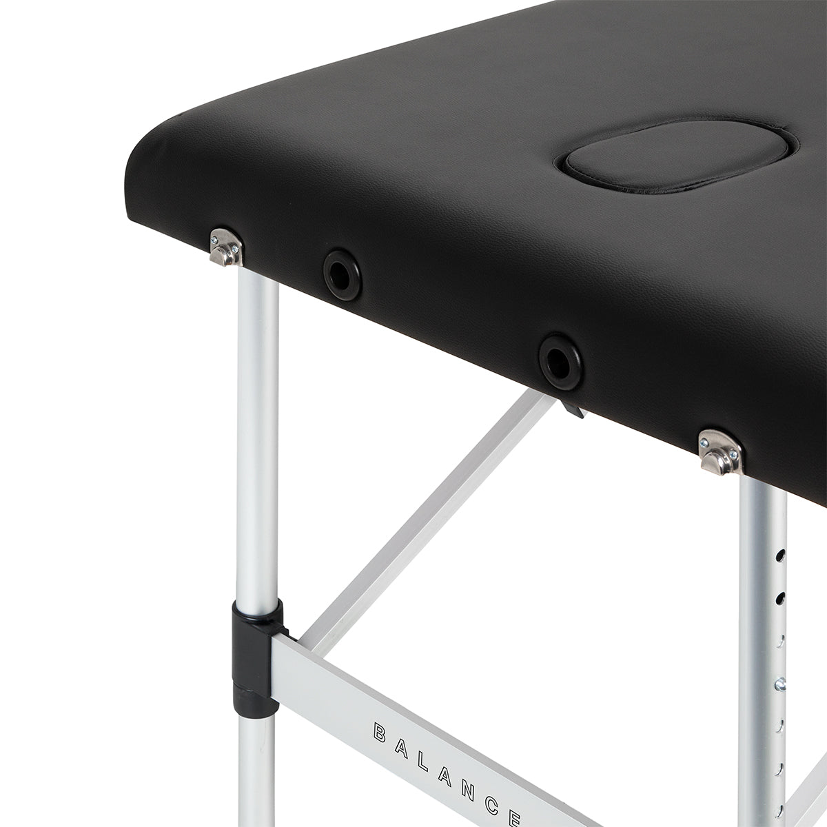 BALANCE aluminium folding massage table with three segments in black, featuring a sturdy frame and cushioned surface for comfort.
