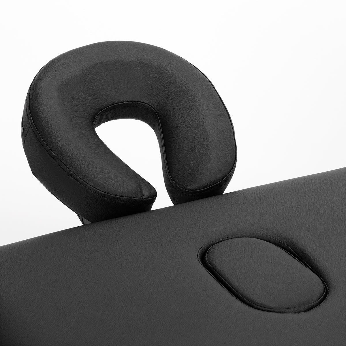 Black BALANCE aluminium folding massage table with three-segment design, lightweight and portable for professional massage therapy sessions.
