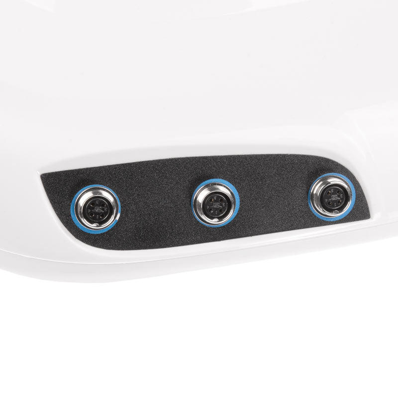 Infrared blanket and dermomassage device by Beauty System, shown in use with plush fabric and control panel visible.