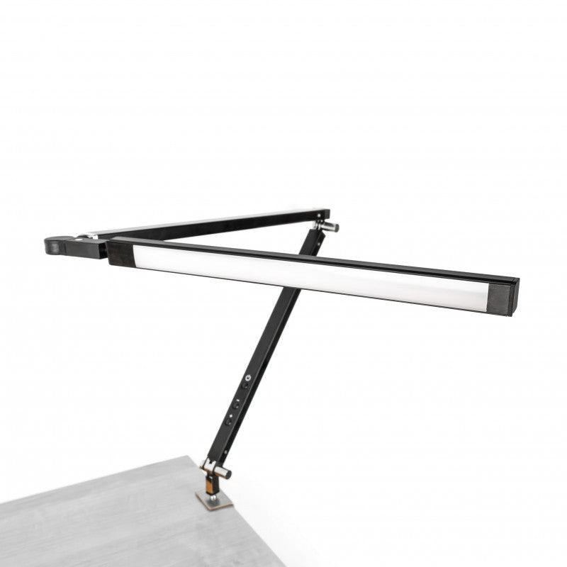 Foldable portable desk lamp by BVShop with adjustable brightness and compact design for convenient lighting at home or office.