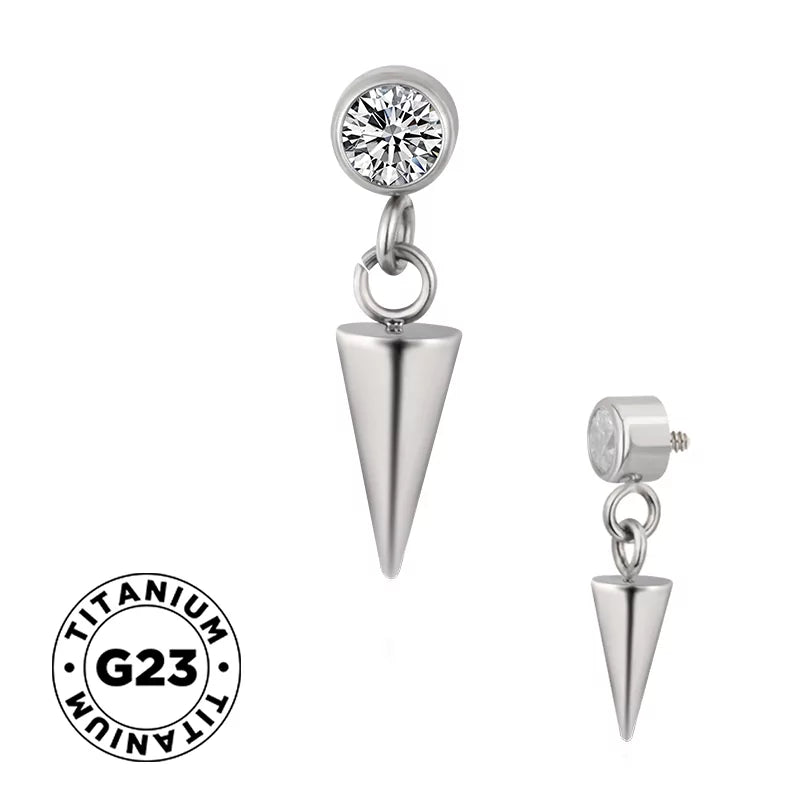 Bague en titane avec pointe et sertissage