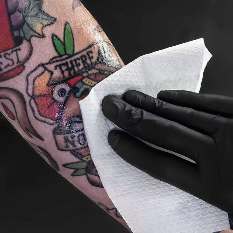 Unistar Nebula tattoo paper towel wipes, 100-pack, soft disposable wipes for tattoo aftercare and cleaning.