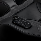 Black Sakura 3D Sakura Maximus 809 massage chair with padded upholstery and built-in control panel, designed for full-body relaxation.