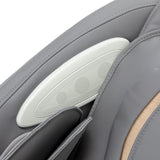 White and grey Sakura Maximus 809 3D massage chair showing sleek design and padded armrests in a modern massage furniture setting.