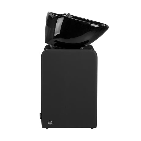 Black Omega Nautica hairdressing wash unit with sink, faucet, and adjustable chair for salon styling and hair washing.