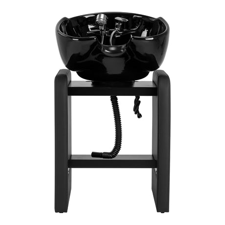 Omega Nautica black hairdressing wash unit with sink and chair for salon styling and hair treatments.