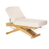 Cream SPA lounger Sillon Siesta with light brown base, designed for beauty salon furniture, comfortable and stylish for client relaxation.