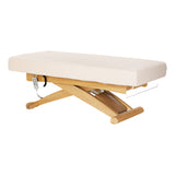 Cream SPA lounger Sillon Siesta beauty salon furniture with light brown base, comfortable and stylish for client relaxation.