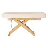 Cream SPA lounger Sillon Siesta beauty salon furniture with light brown base, comfortable and stylish for salon treatments.