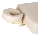 Cream-colored SPA lounger Sillon Siesta with a light brown base, designed for beauty salon furniture.