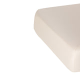 Cream Sillon Siesta spa lounger with light brown base, designed for beauty salon furniture and relaxation.