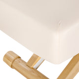 Cream SPA lounger Sillon Siesta with light brown base, beauty salon furniture ideal for relaxing treatments.