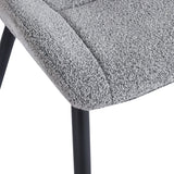 Black metal leg detail on 4RICO Lucente grey upholstered chair