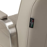 Beige Gabbiano Acri hairdressing chair with cushioned seat and backrest, adjustable height, and modern design.
