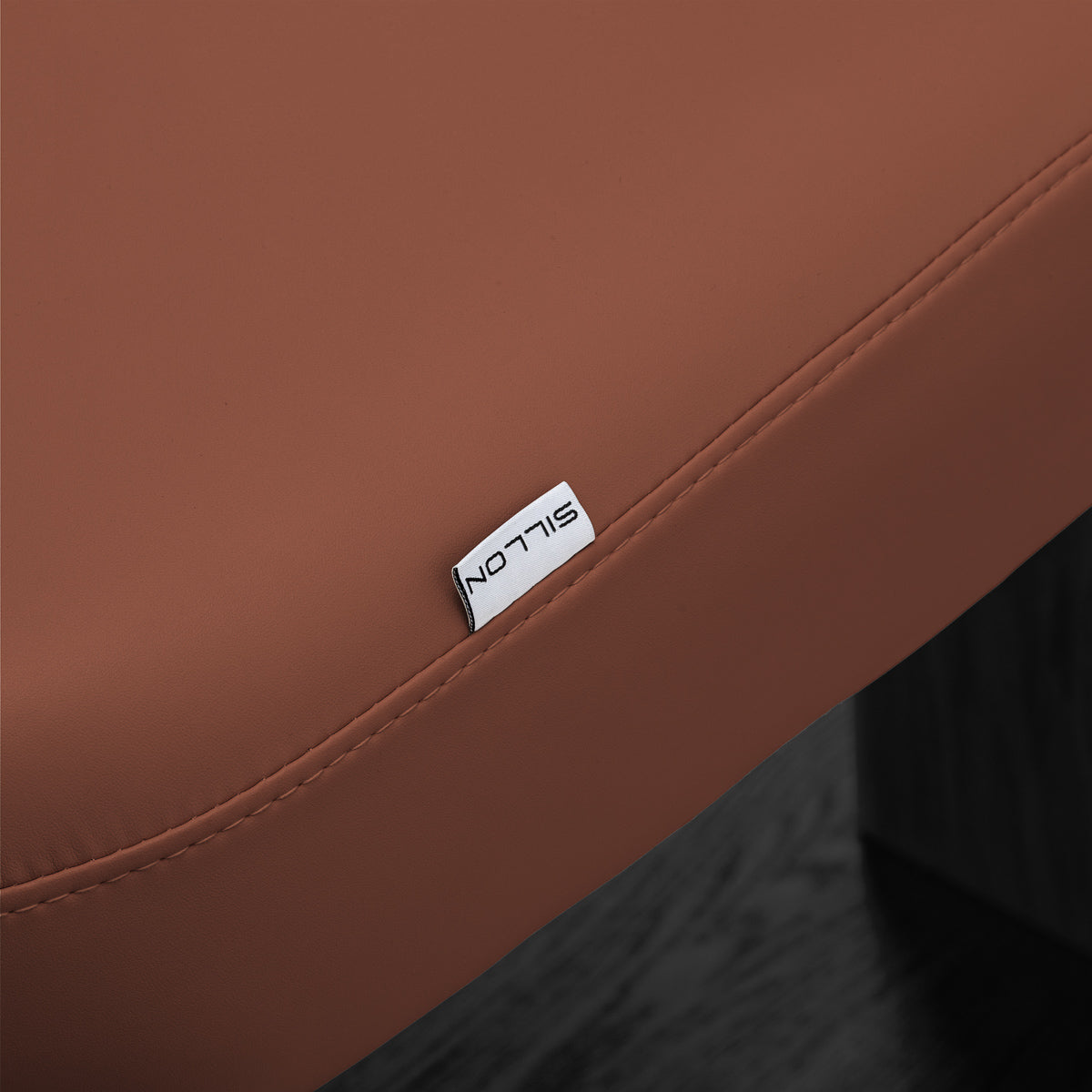 Sillon Relax · brun / noir · étiquette Sillon et couture