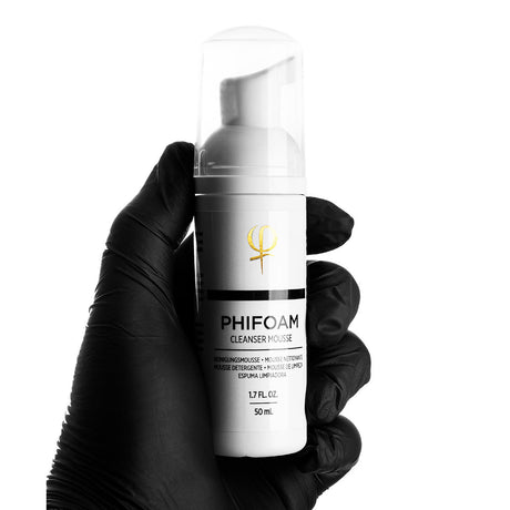 PhiAcademy Phi Foam Cleansing Foam 50ml — 50ml foam bottle held in a gloved hand
