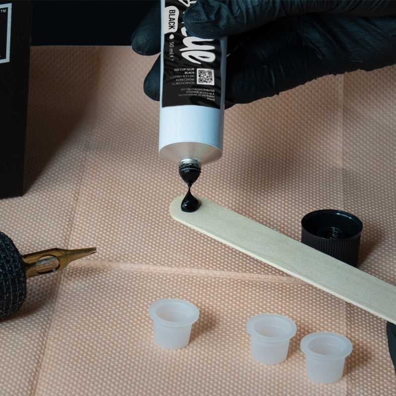 Unistar Cup Ink Glue 50g in a small white cup, showing the adhesive texture for crafting and bonding applications.