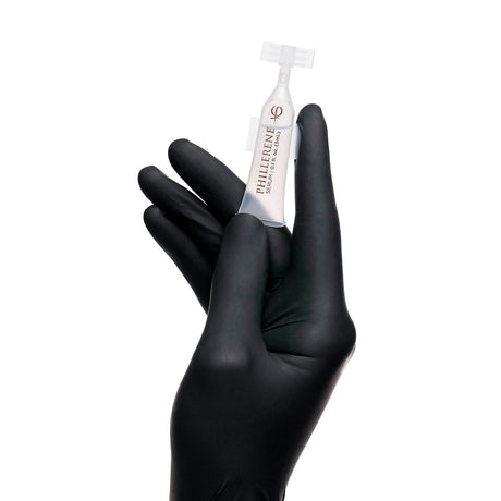 PhiAcademy Phillerene Collagen Serum 3ml 5pcs — individual Phillerene ampoule held in a gloved hand