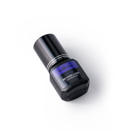 PhiLashes Beyond Lash Adhesive — adhesive bottle shown at an angle