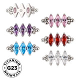 Bague en titane avec triple perle et sertissage