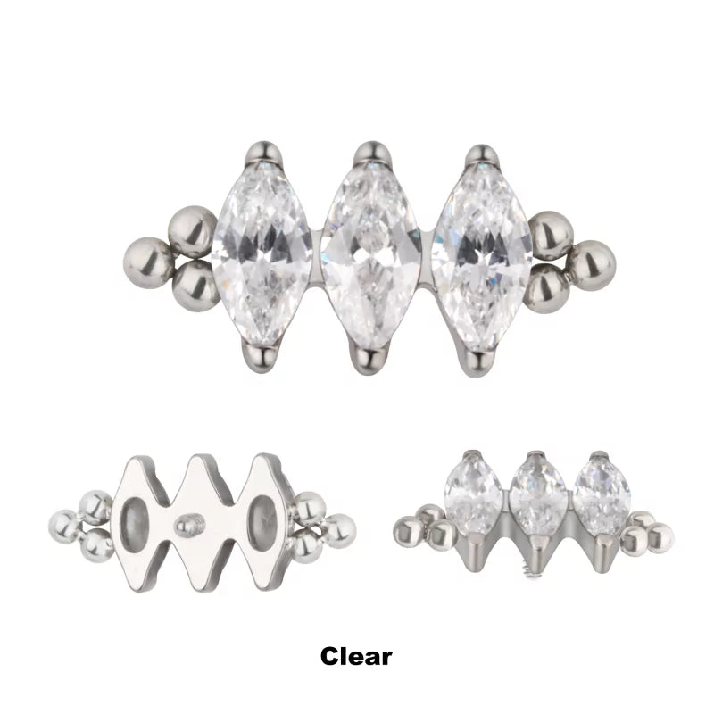 Bague en titane avec triple perle et sertissage