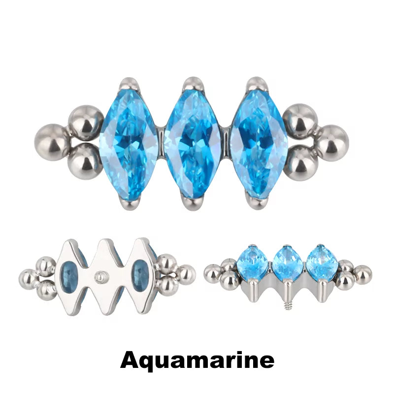 Bague en titane avec triple perle et sertissage